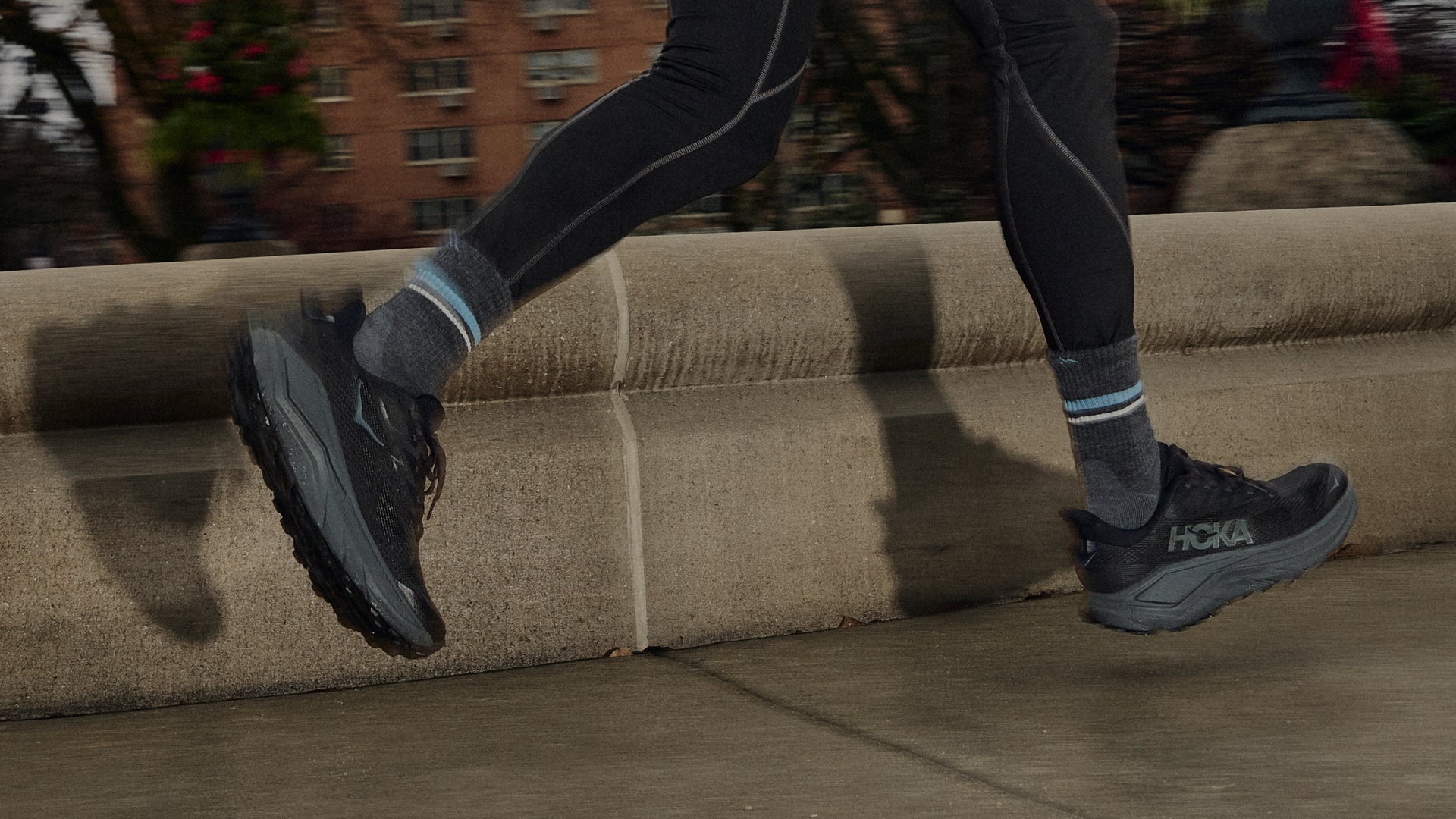 Model running in the new element micro crew in gray