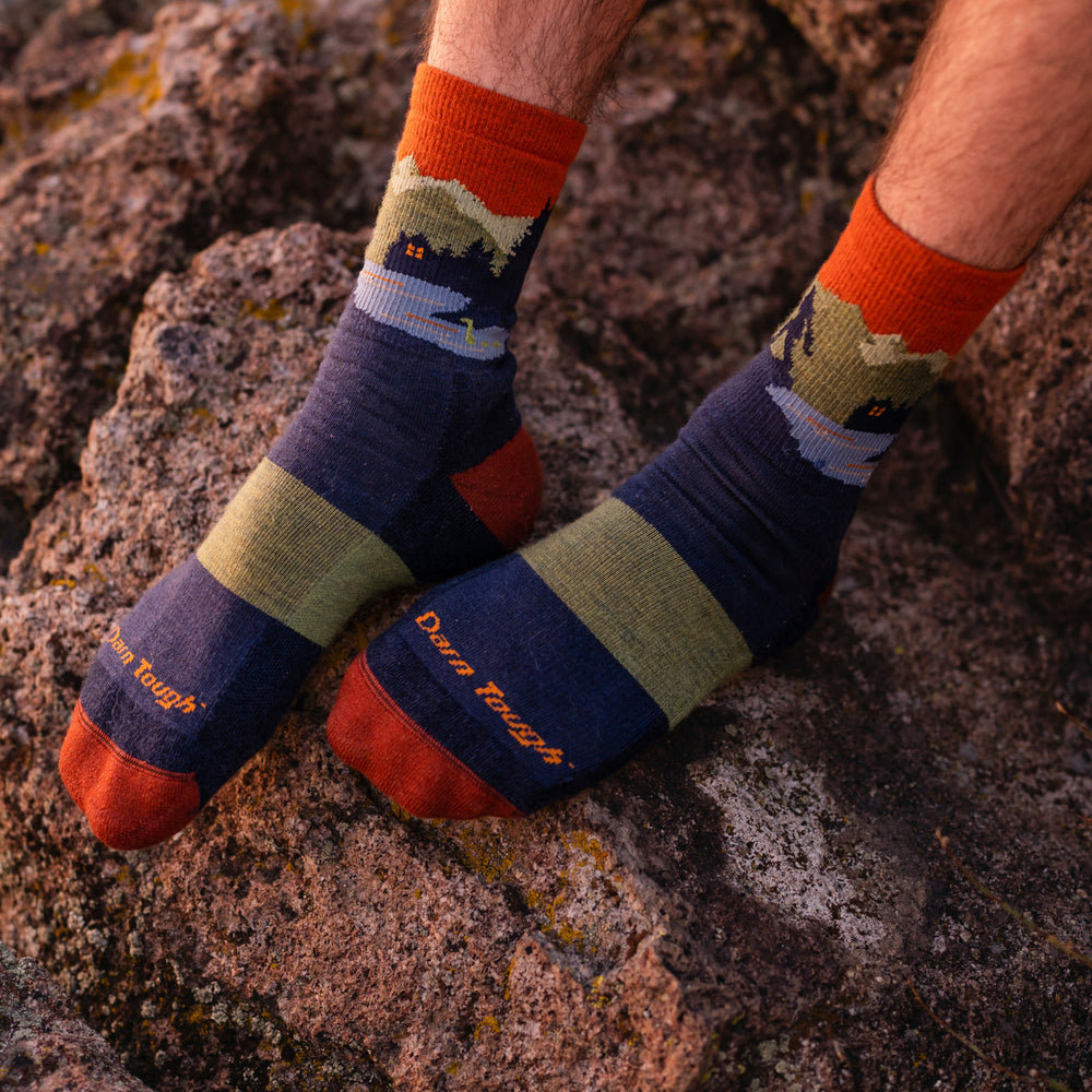 Close up on model wearing the 5014 Close Encounters in Eclipse while rest feet on rock