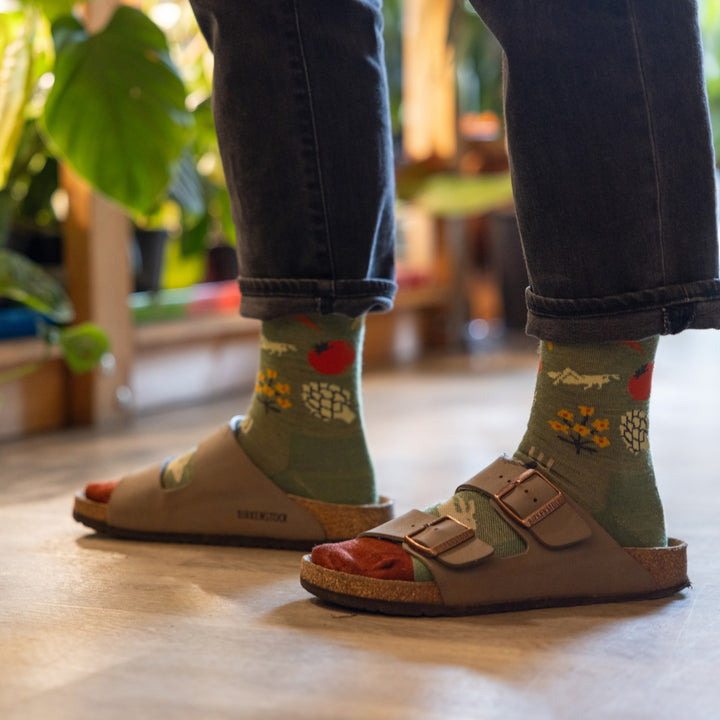 close up of model wearing sandals and the 6054 willow in house