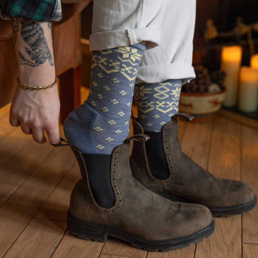 close up om model pulling on shoe wearing the 6088 Light denim 