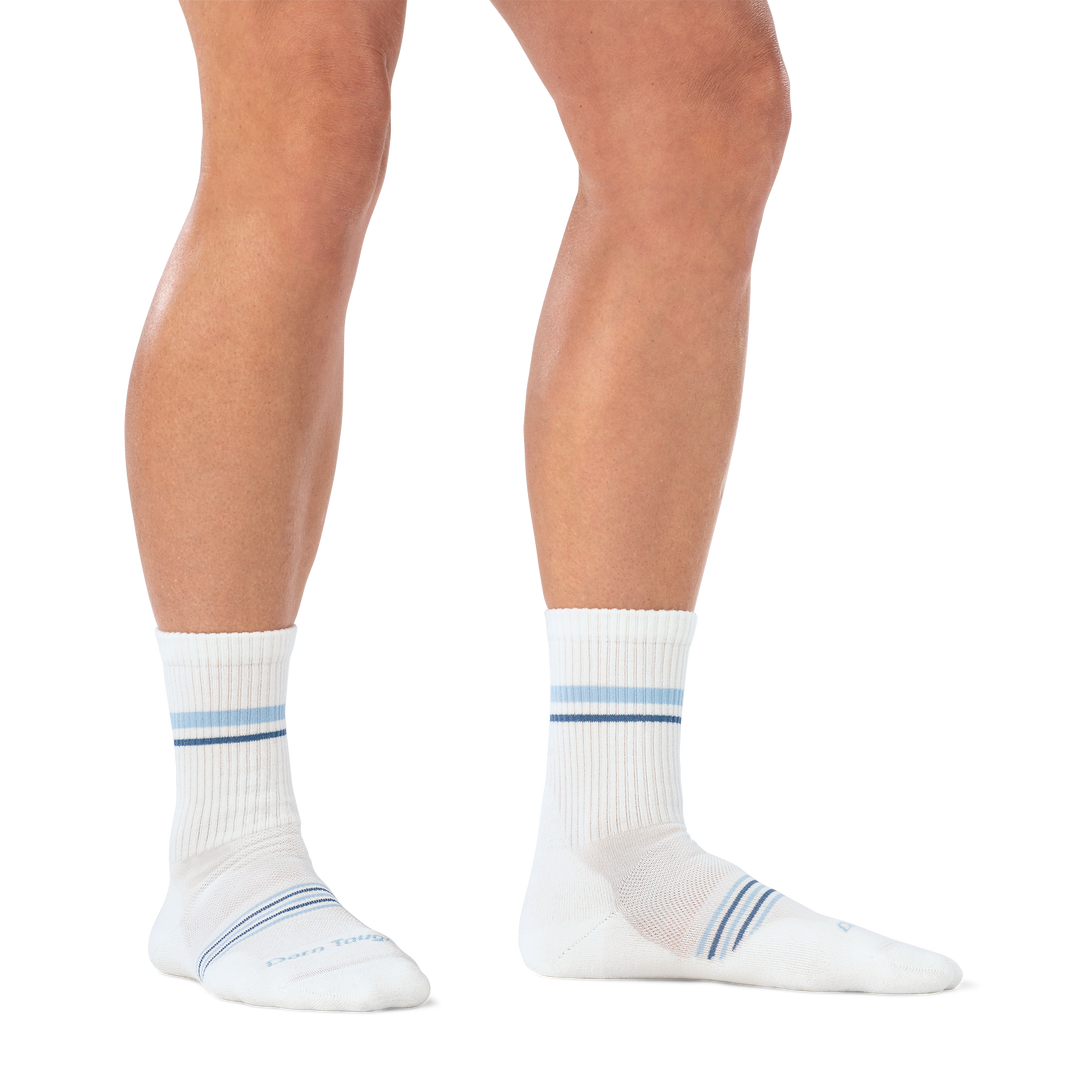 on model image of woman barefoot in staggered stance wearing 1114 vapor white micro crew lightweight with cushion sock