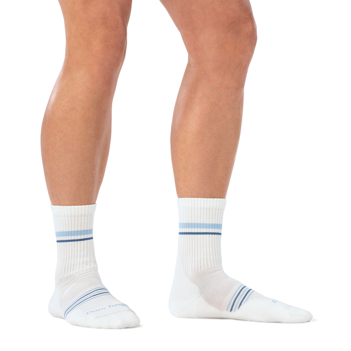 on model image of woman barefoot in staggered stance wearing 1114 vapor white micro crew lightweight with cushion sock