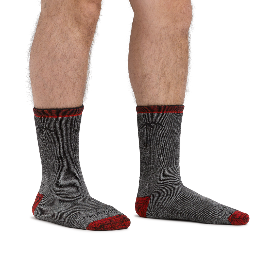 Man standing barefoot wearing Mountaineering Micro Crew Heavyweight Hiking Socks in Smoke