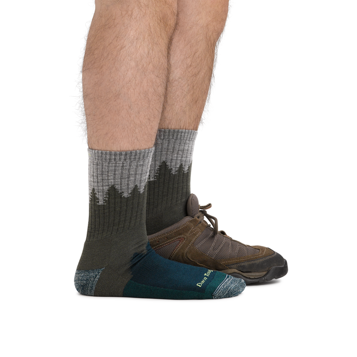 Man wearing Number 2 Micro Crew Midweight Hiking Socks in green, with back foot also wearing a hiking shoe