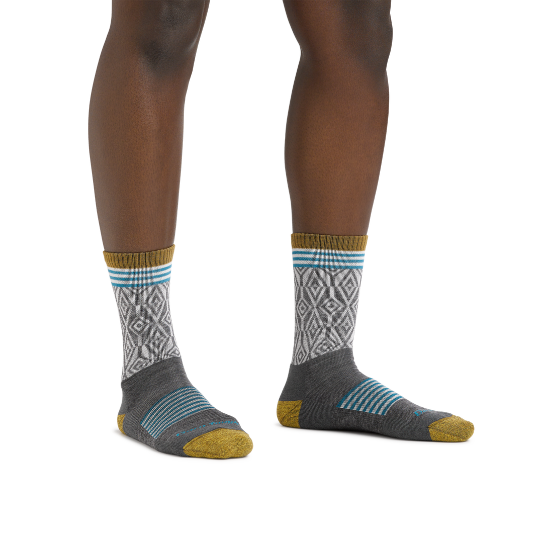 Image of a woman's legs on a white background wearing Women's Sobo Micro Crew Lightweight Hiking Socks in Gray