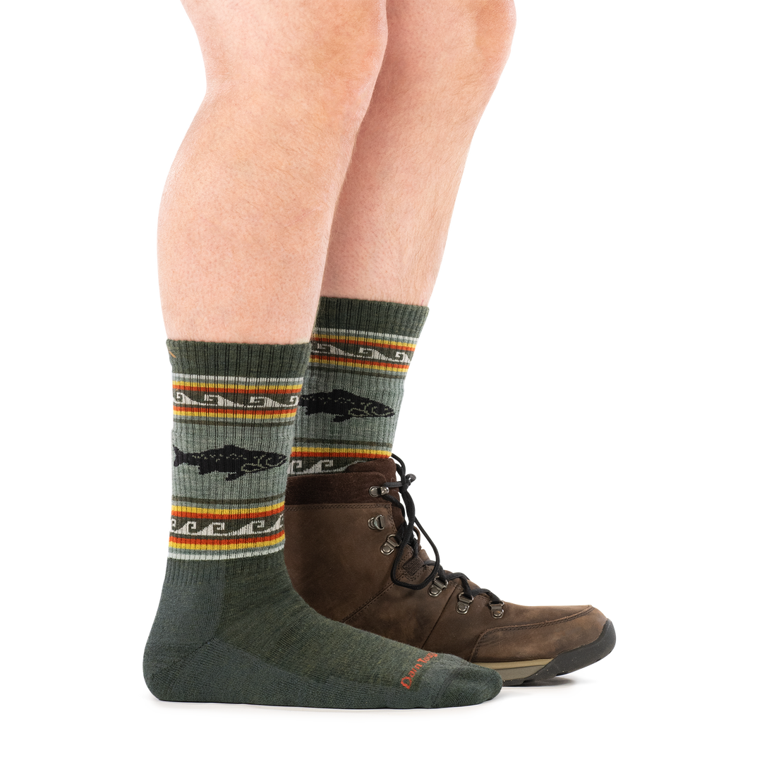 model wearing hiking boot on back foot and 1980 trout river boot midweight with cushion sock side profile