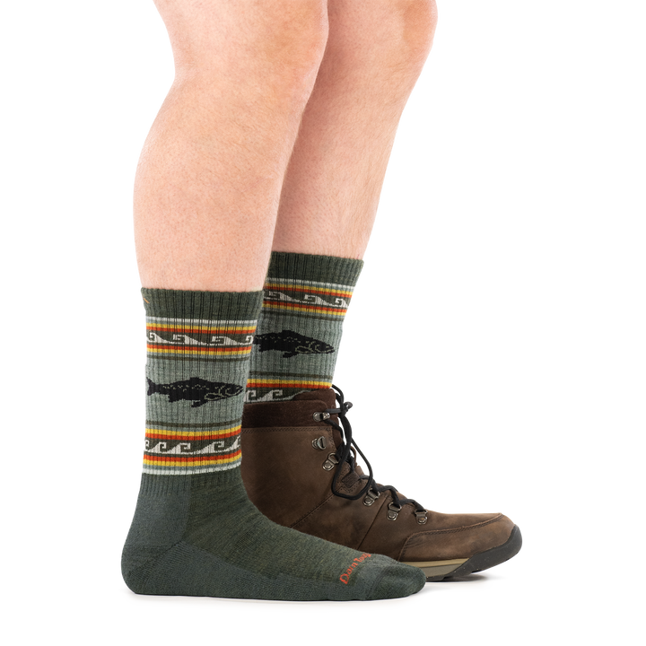 model wearing hiking boot on back foot and 1980 trout river boot midweight with cushion sock side profile
