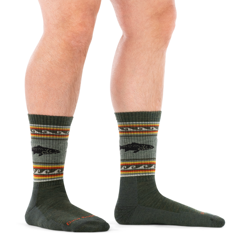 on model image of man in staggered stance barefoot wearing 1980 trout river boot midweight with cushion sock