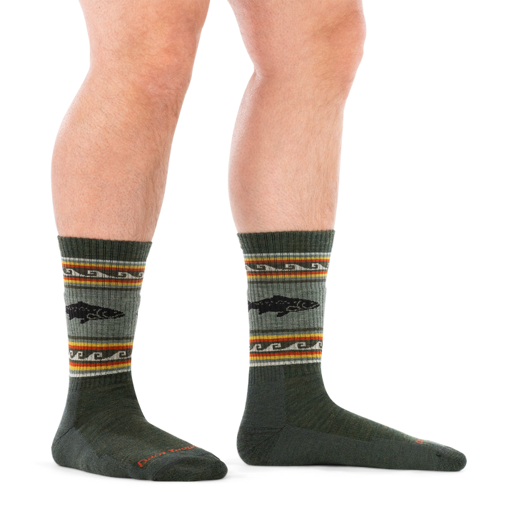 on model image of man in staggered stance barefoot wearing 1980 trout river boot midweight with cushion sock