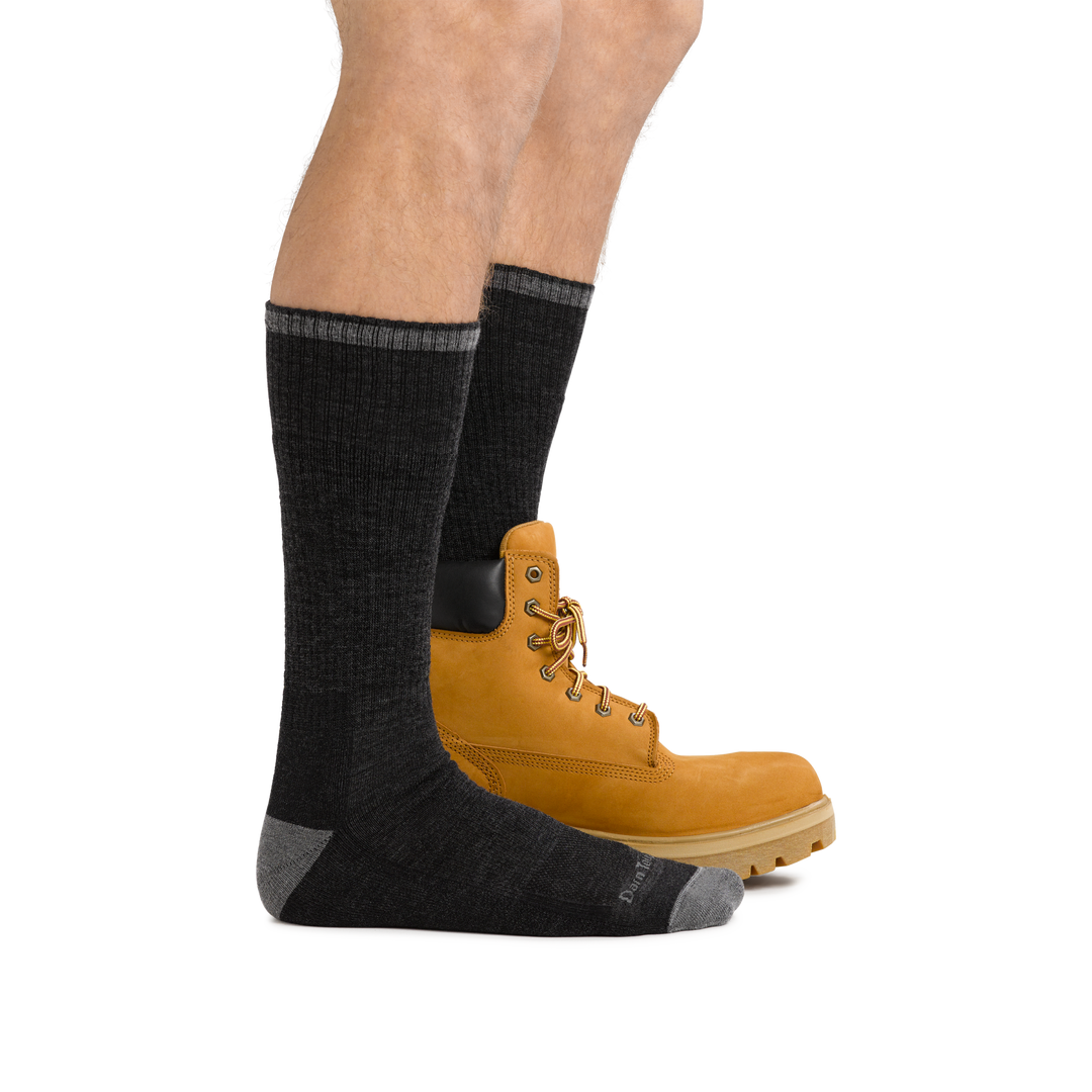 Male legs facing to the right wearing John Henry Boot Midweight Work Sock in Gravel and back foot also in a work boot