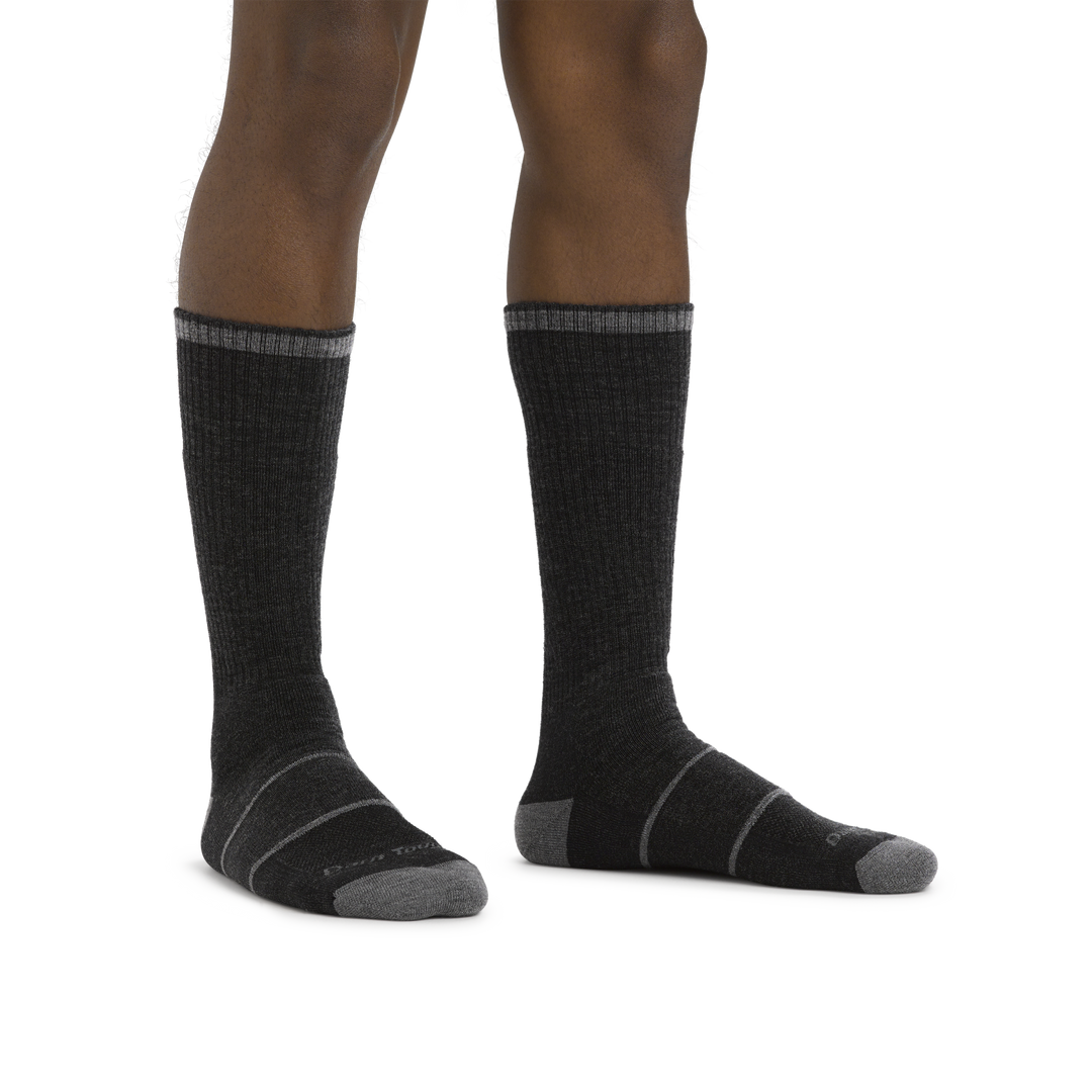 Man standing barefoot wearing William Jarvis Boot Midweight Work Sock in Gravel