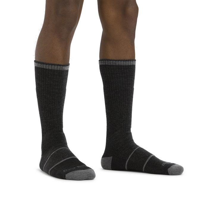 Man standing barefoot wearing William Jarvis Boot Midweight Work Sock in Gravel