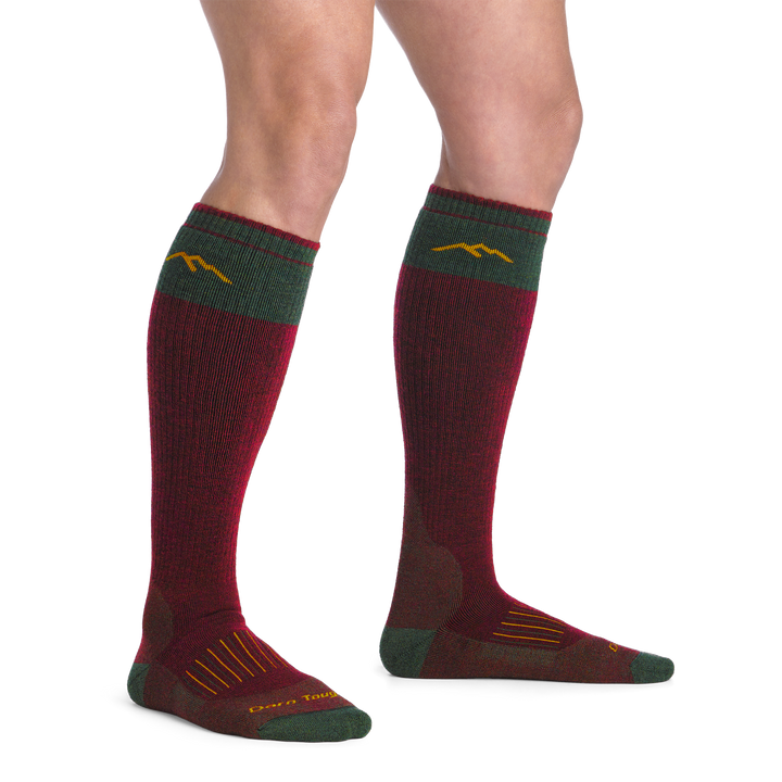 on model image bare foot wearing the 2105 hunting over the calf sock in ember colorway