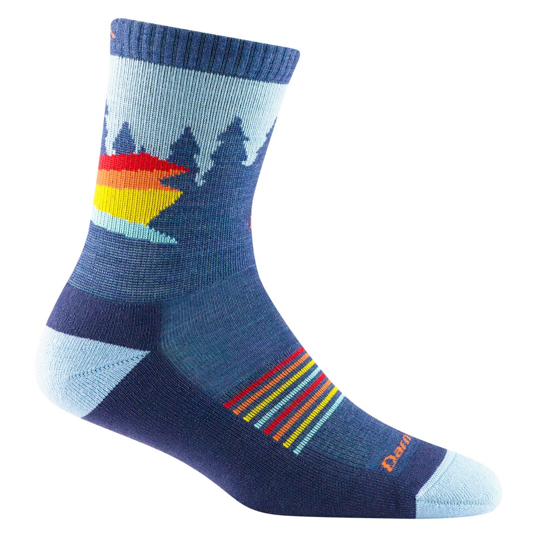 reverse 3037 kids van wild micro crew sock in color demin blue with tree silhouettes and red, orange, and yellow stripe details