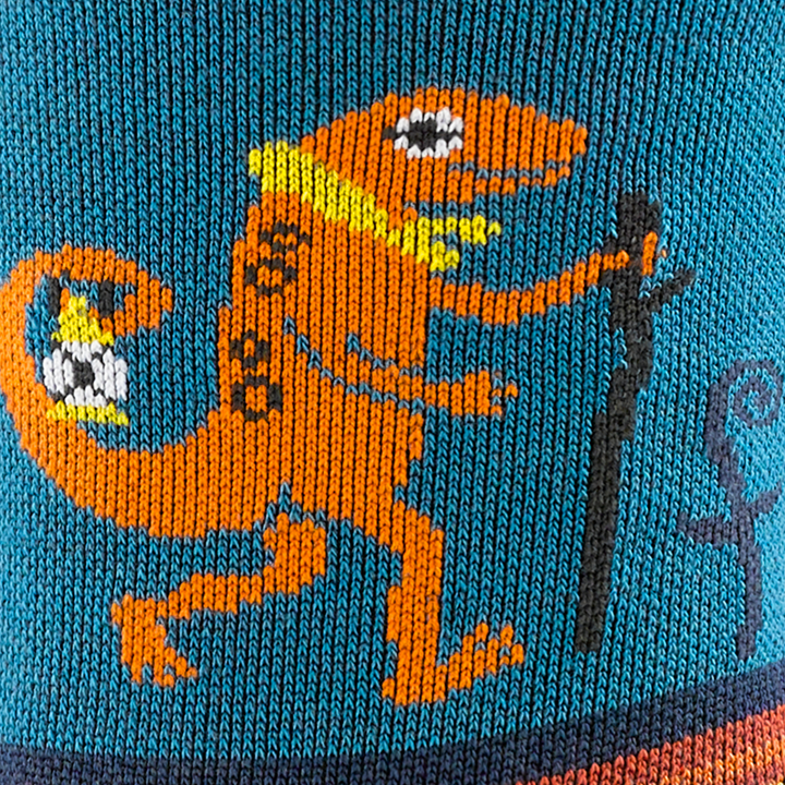 Call out detail image of the of the 3043 Lava front image of the hiking Lizard with a lantern hanging from his tail
