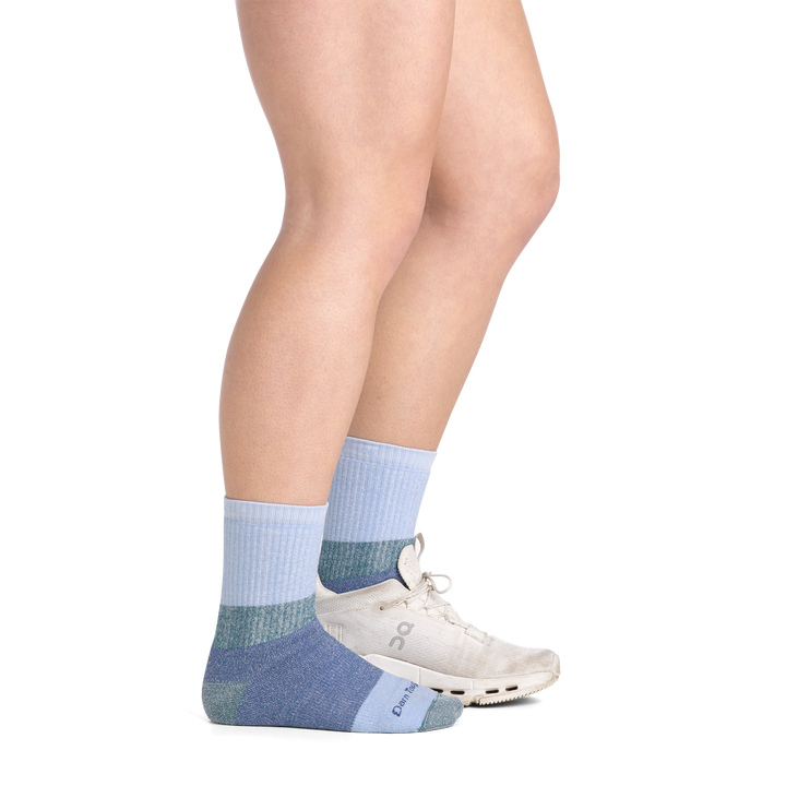 on model image side view shoe on back foot wearing the 3045 hill topper micro crew sock in Dragonfly colorway