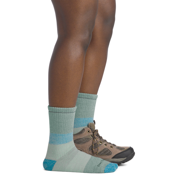 on  model image side view back foot in shoe wearing the 5011 micro crew mountaineering sock in reed colorway