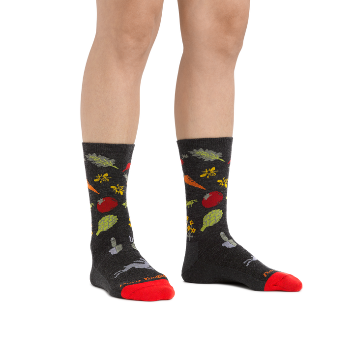 Woman's legs on a white background wearing Women's Farmer's Market Crew Lightweight Lifestyle Socks in Charcoal