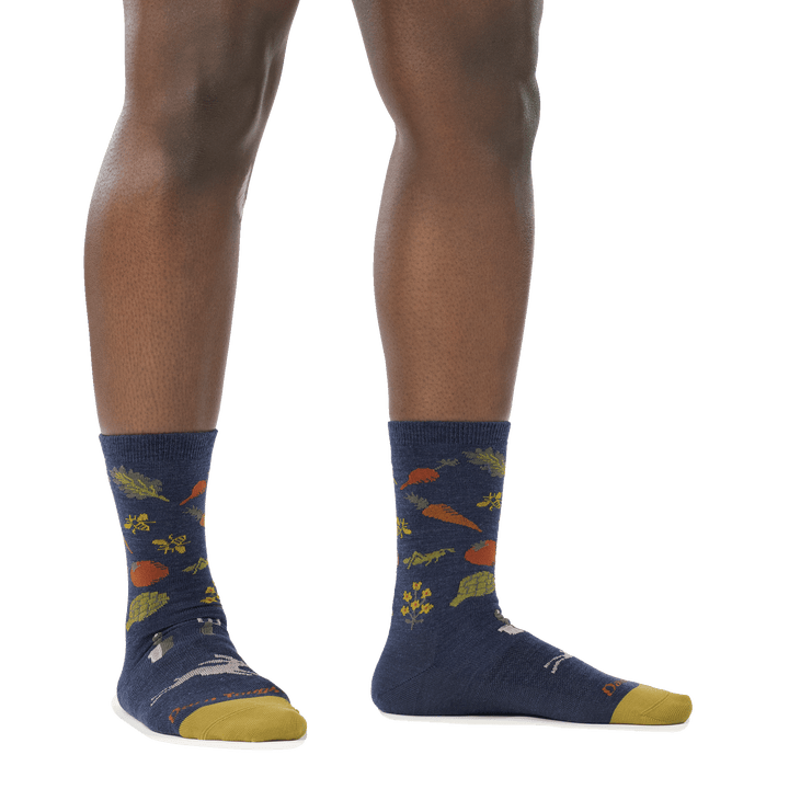 on model image of woman barefoot in staggered stance wearing 6054 indigo crew lightweight sock