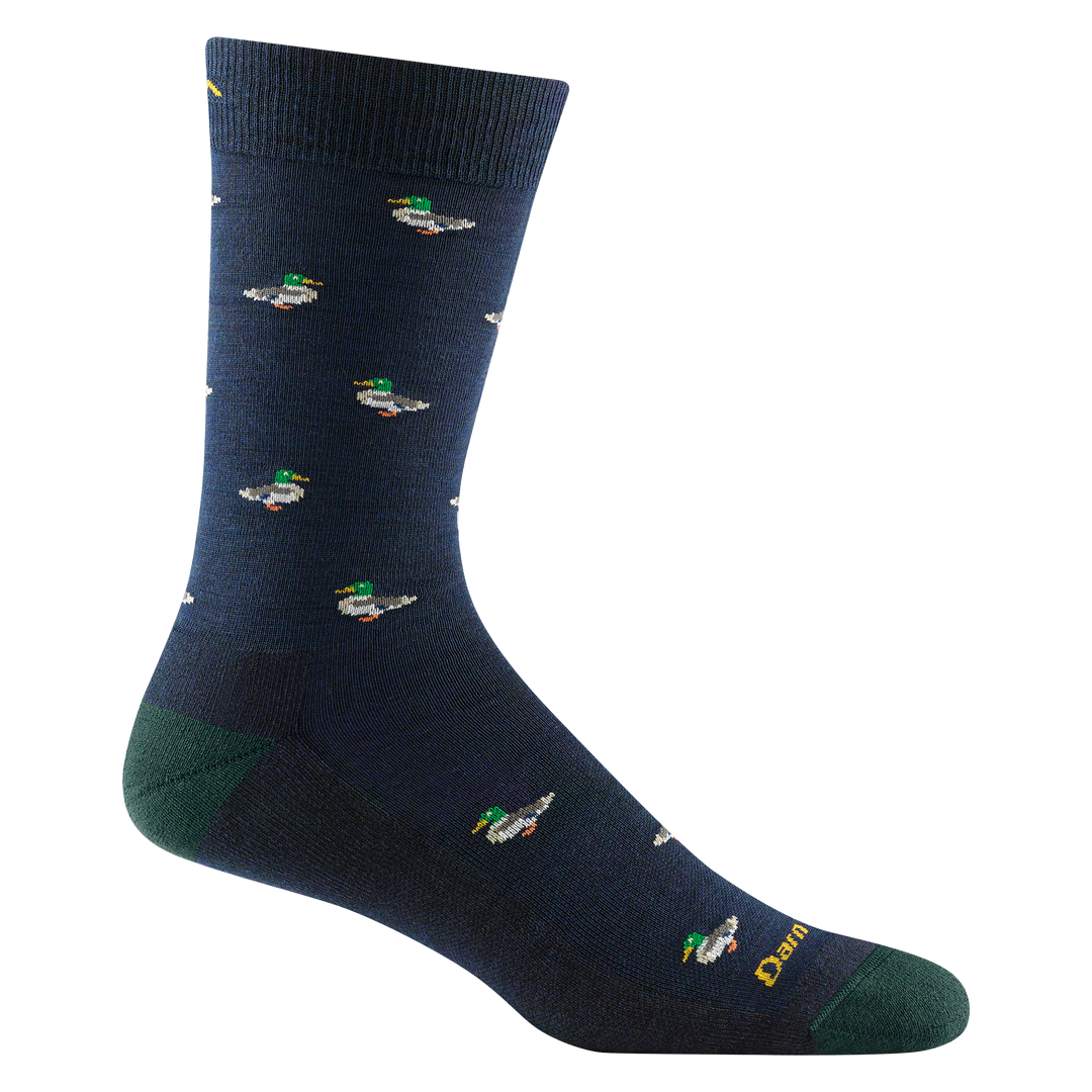 Reverse side of men's duck duck moose crew lifestyle sock in navy with gold darn tough signature on forefoot