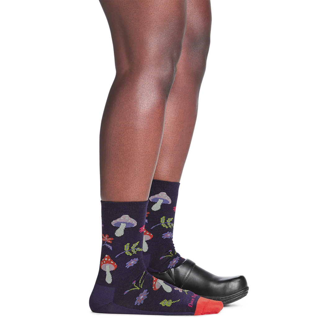 on model image back foot in clog wearing the 6133 shroom bloom lifestyle crew sock in blackberry colorway