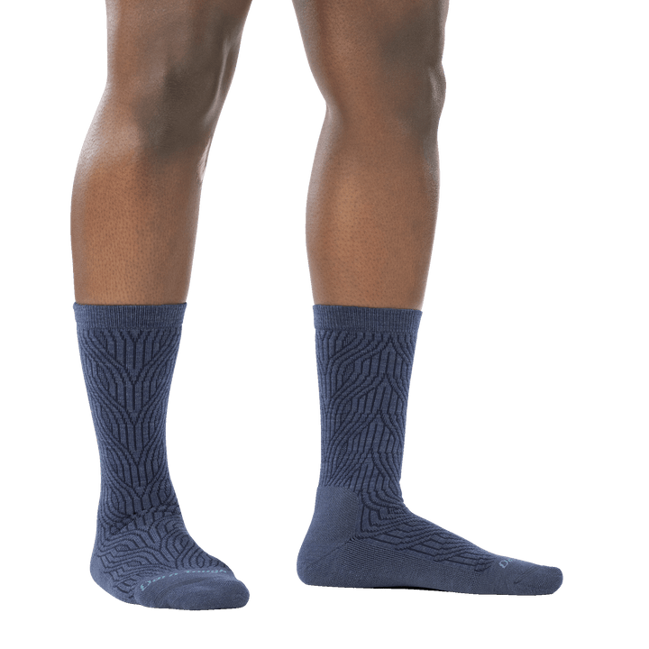 on model image of woman barefoot wearing 6140 denim cable crew lightweight sock with cushion