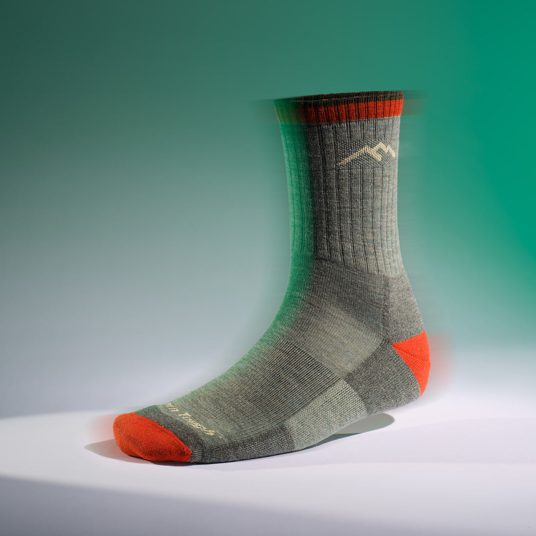 men's hiker micro crew sock in the color sage on a foot form