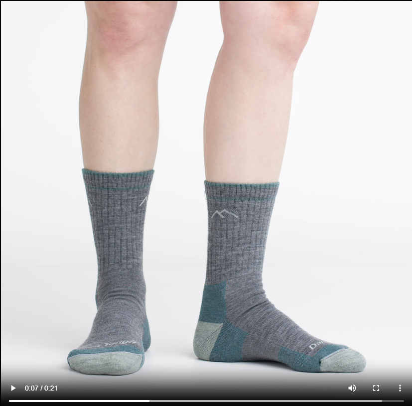 Video of model wearing hiker micro crew socks in slate, rotating their feet to show the fit of the socks.