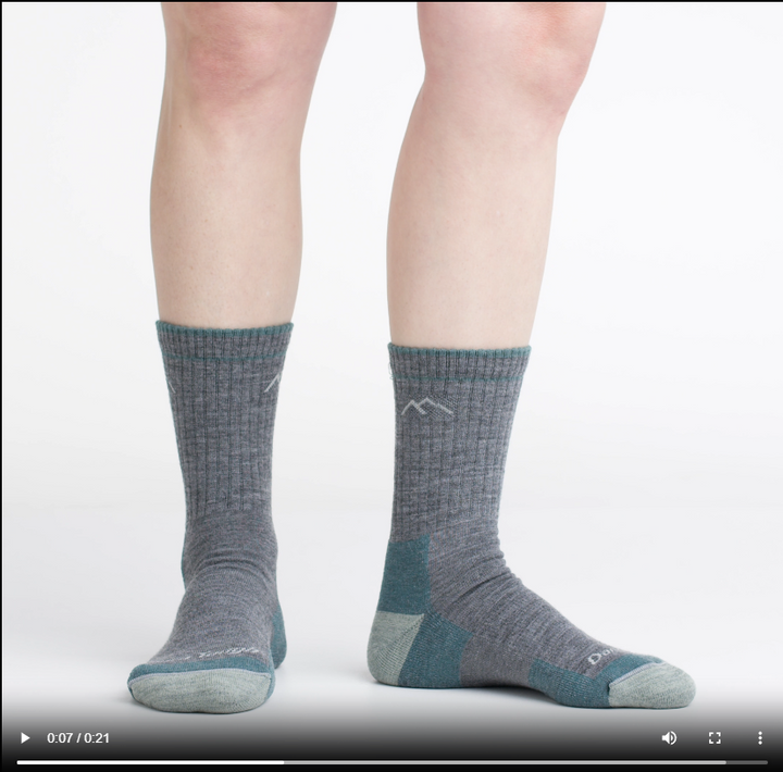 Video of model wearing hiker micro crew socks in slate, rotating their feet to show the fit of the socks.