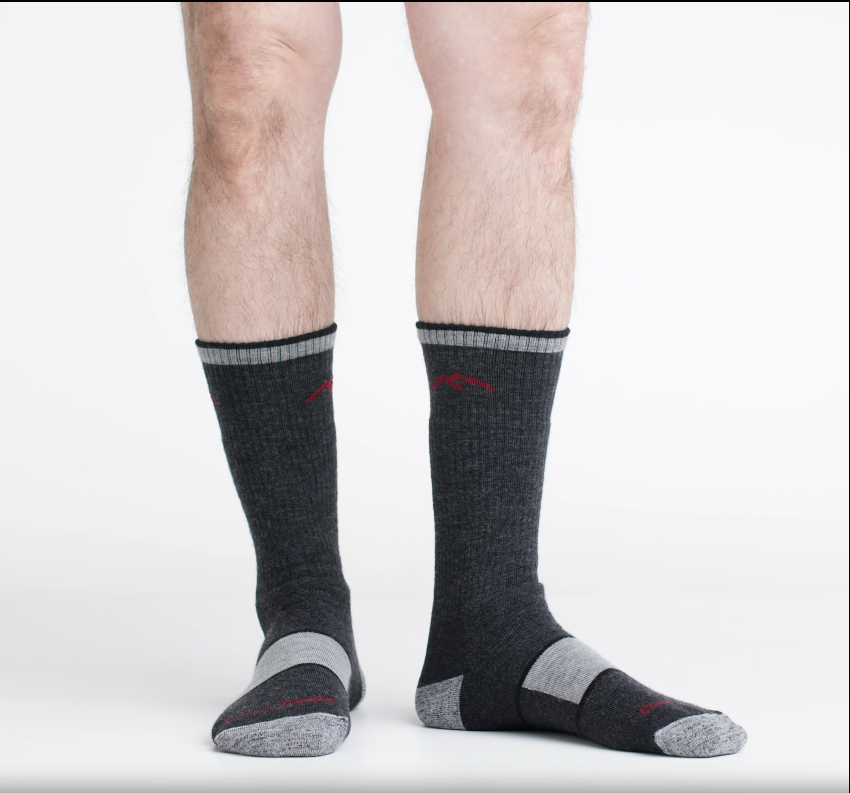 Video of model wearing hiker boot socks in Black, rotating around to show the fit of the socks.